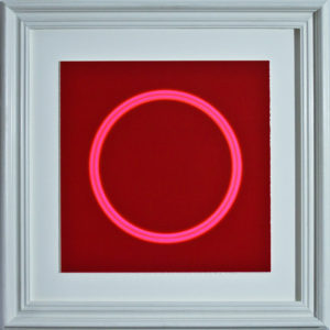 Pink circle on red background