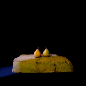 Two pears on a stone slab