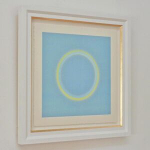 Blue and Yellow rings on blue background, framed